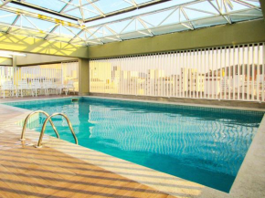 Otimo Flat a 200m - Praia das Pitangueiras Guaruja